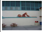 Sports mural around the Campbell Community Center swimming pool
